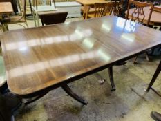 Mahogany pedestal extendable dining table by Rackstraw