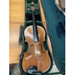 Two violins both in hard cases