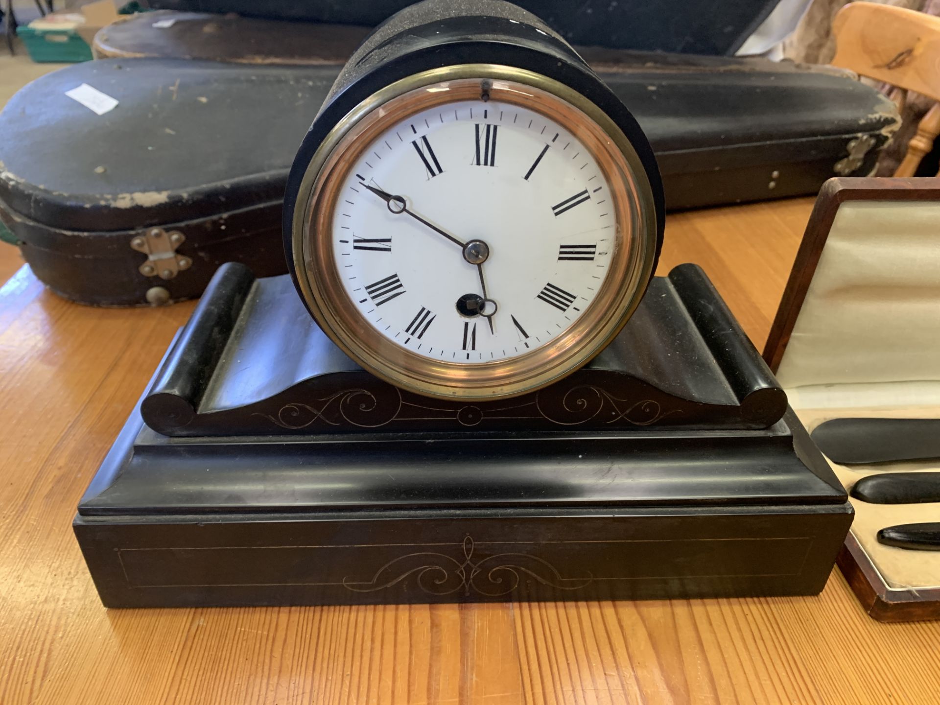 Black slate cased pendulum mantel clock