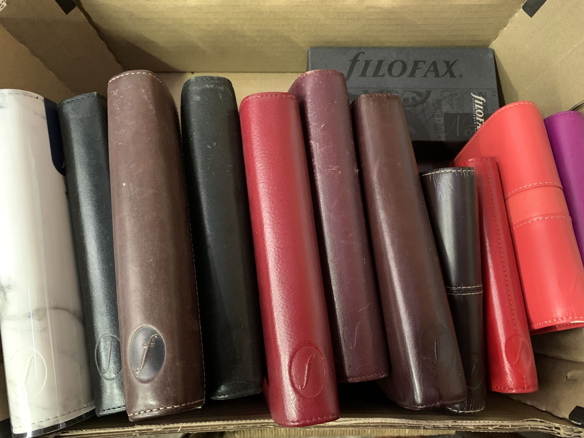 A quantity of filofax organisers.