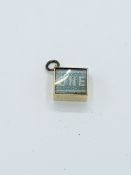 9ct yellow gold "£1" charm,