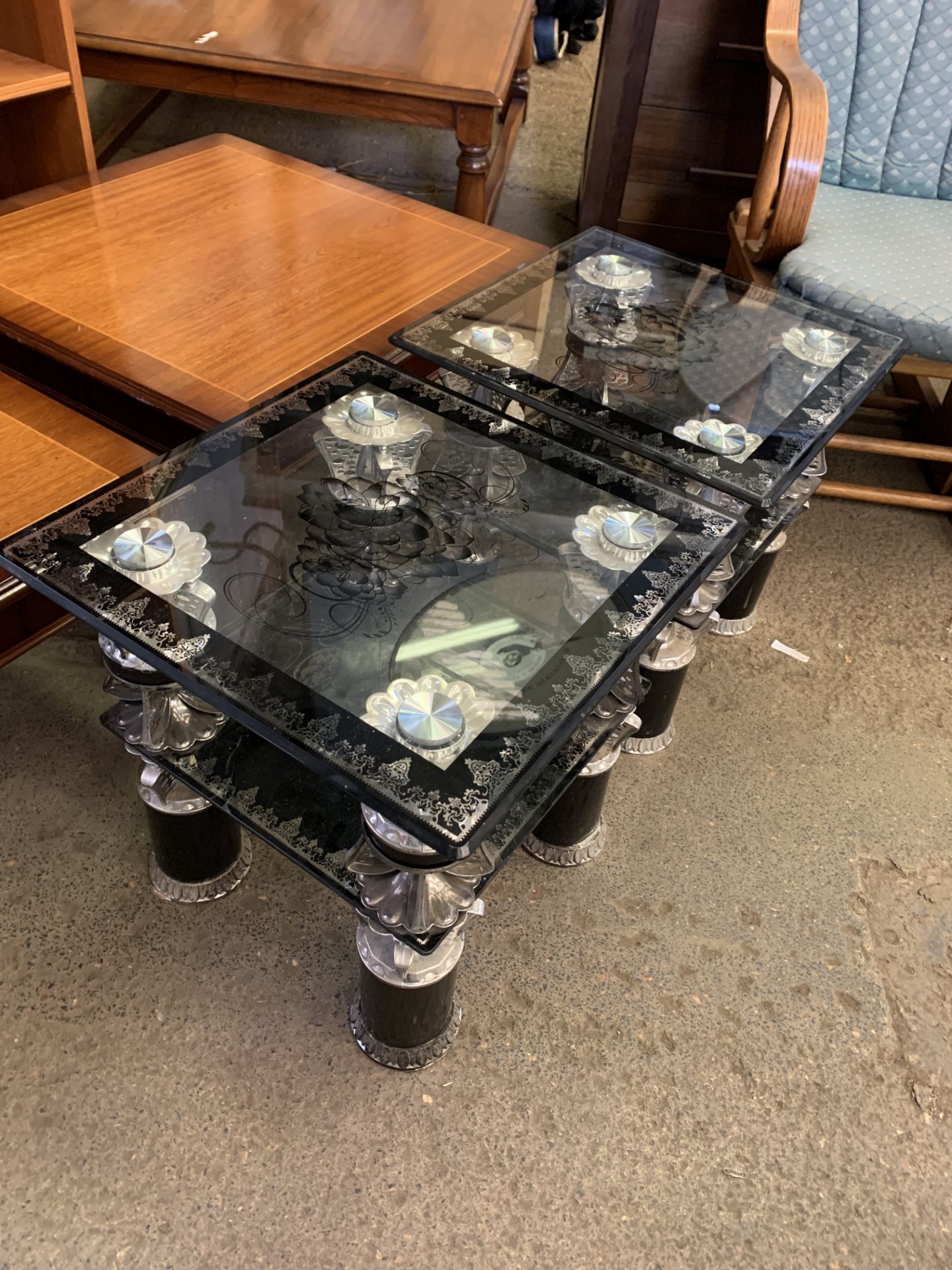 Pair of decorated glass low tables, with glass undershelf