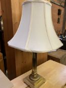 Brass columned table lamp and shade