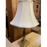 Brass columned table lamp and shade