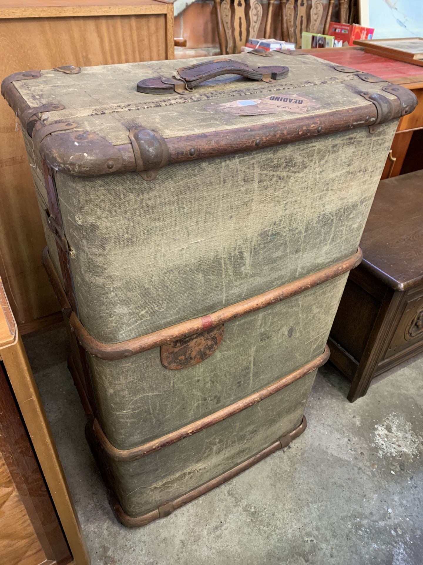 Early 20th Century cabin trunk with wood bandings and labels