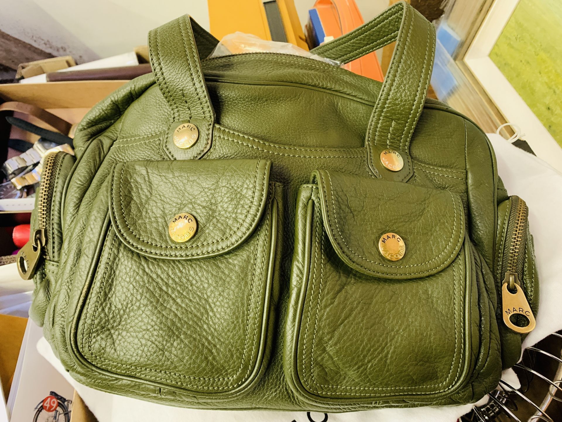 Two leather effect handbags: olive and black