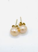 Pearl stud earrings