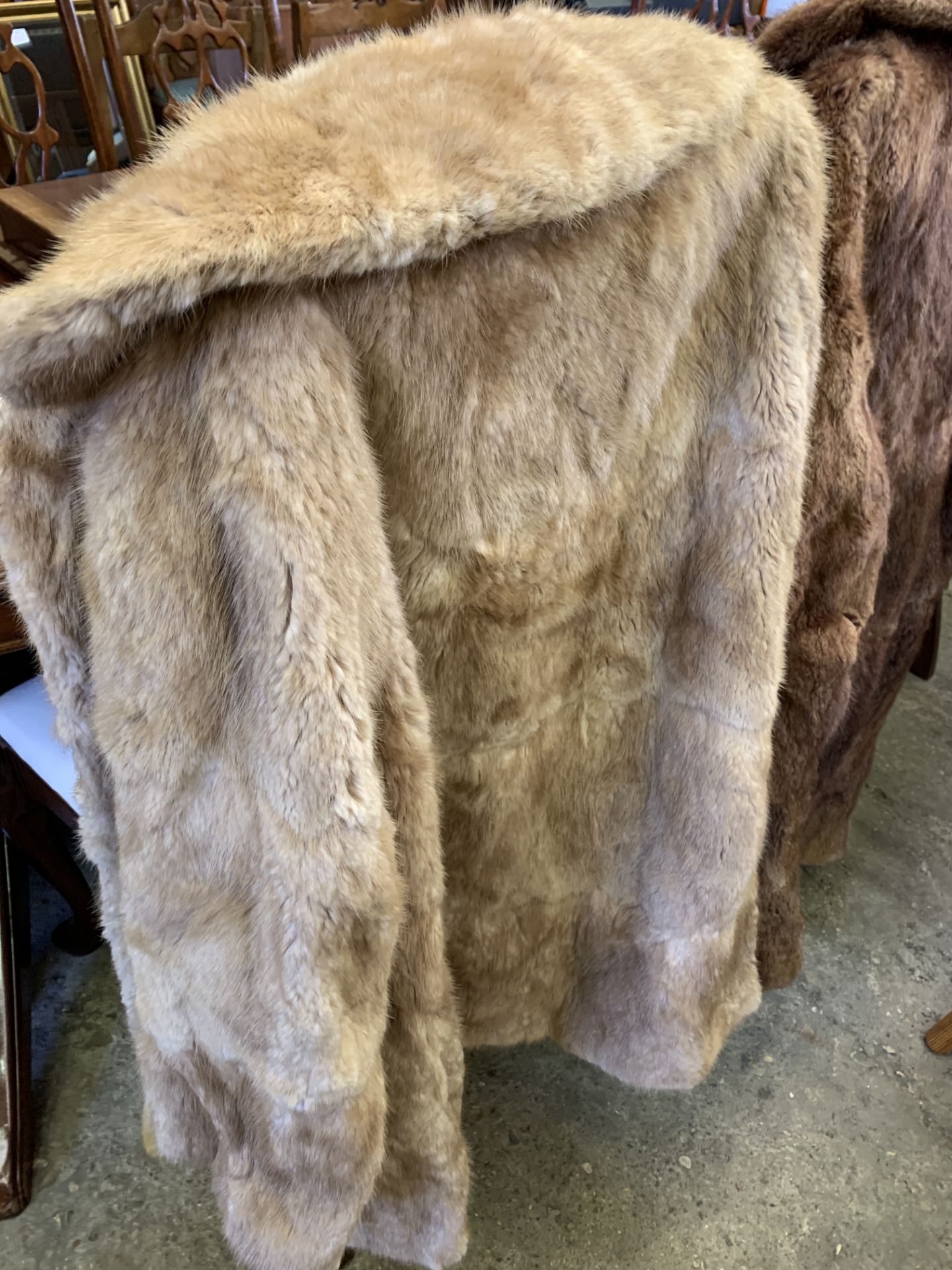 Two fur coats.