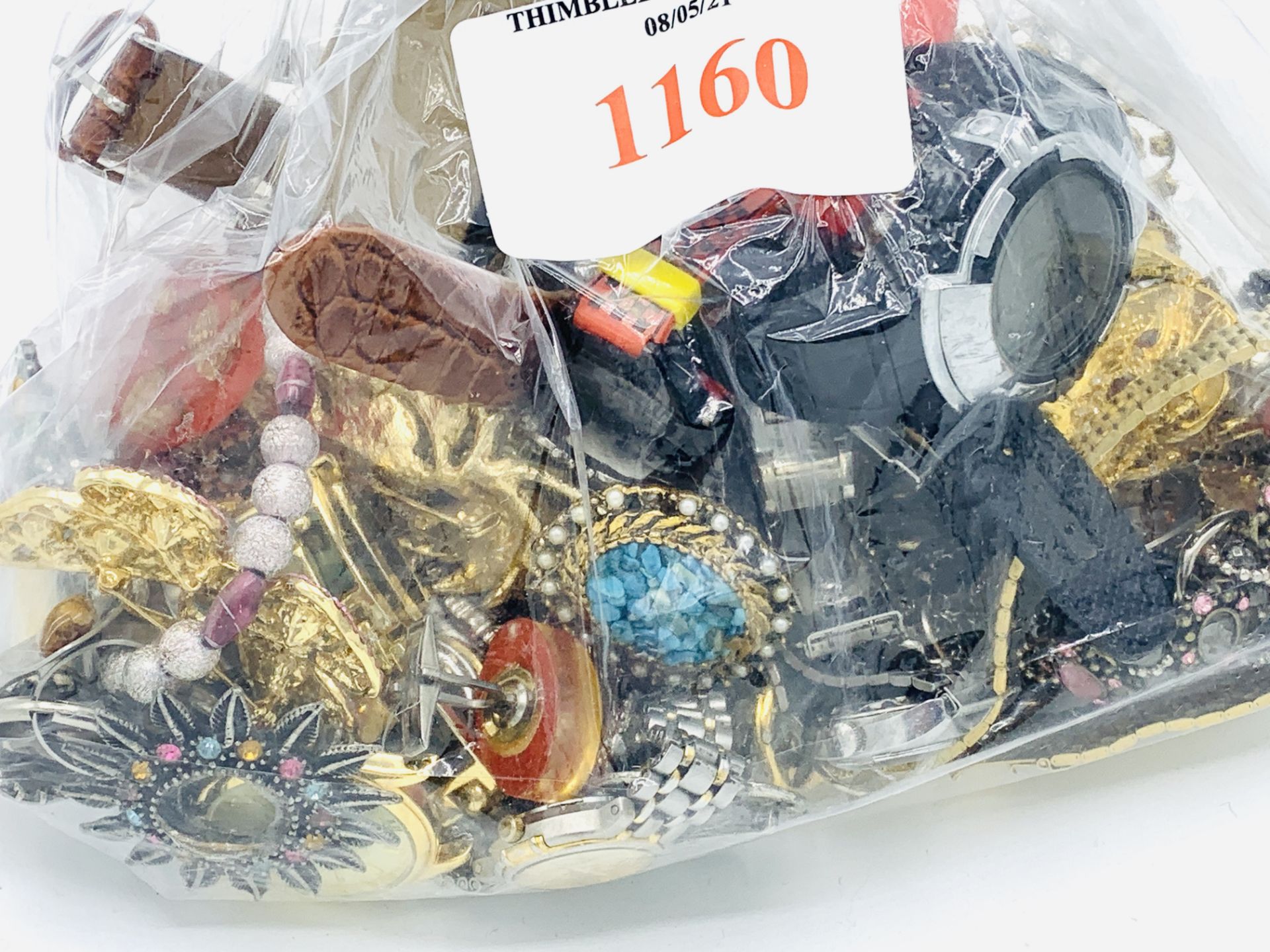 Bag of costume jewellery and fashion watches