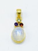 Moonstone and yellow metal pendant