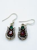 Red, green and white stone earrings on silver