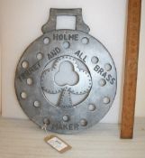 Wooden display board in the form of a horse brass - Wells Brass & Terret Maker.