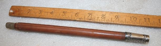 Driving whip handle with leather handpart.