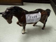 Beswick model of a brown horse.