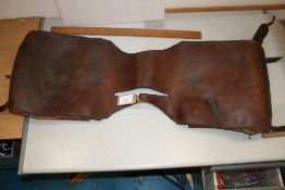 Pair of large leather saddle bags.