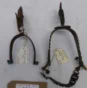 2 unusual rowelled spurs.