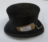 Black top hat by Christy's of London.