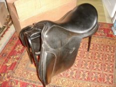 Brown leather dual purpose 18ins saddle made by Saddlers & Outfitters.