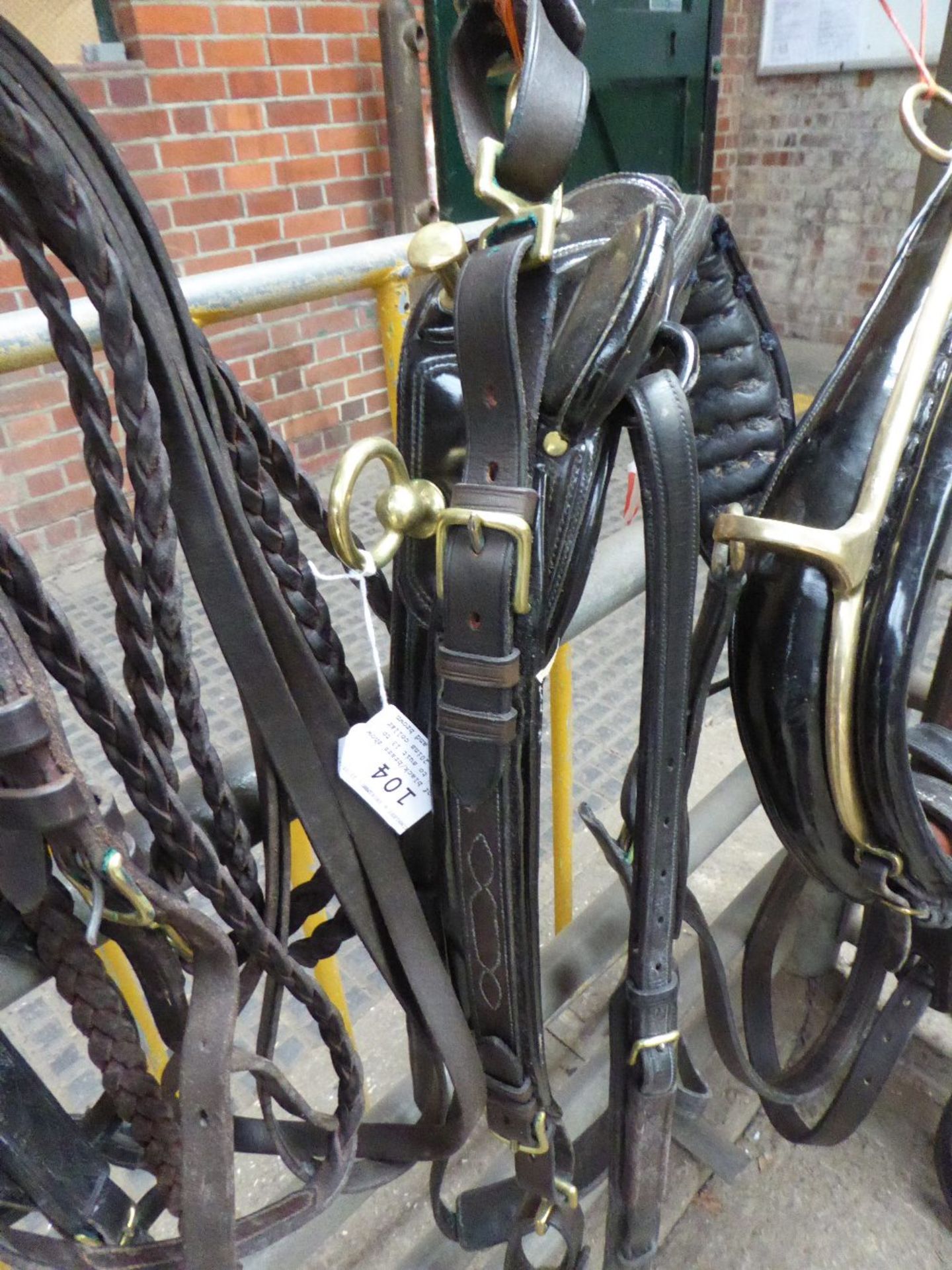 Set of black/brass show harness to suit 13 to 15hh with 20ins collar, Tilbury tugs and brown reins.