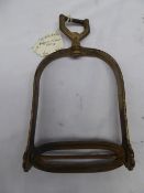 Large ornate swivel tread/eye stirrup.