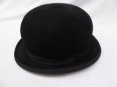 Black bowler hat by Hilhouse & Co.