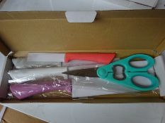 Four piece knife set with scissors.