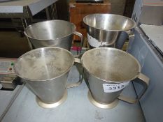 4 stainless steel measuring jugs