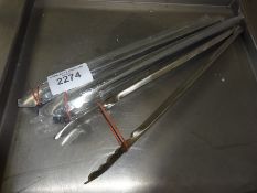 Three large tongs