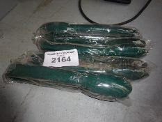 Four plastic tongs