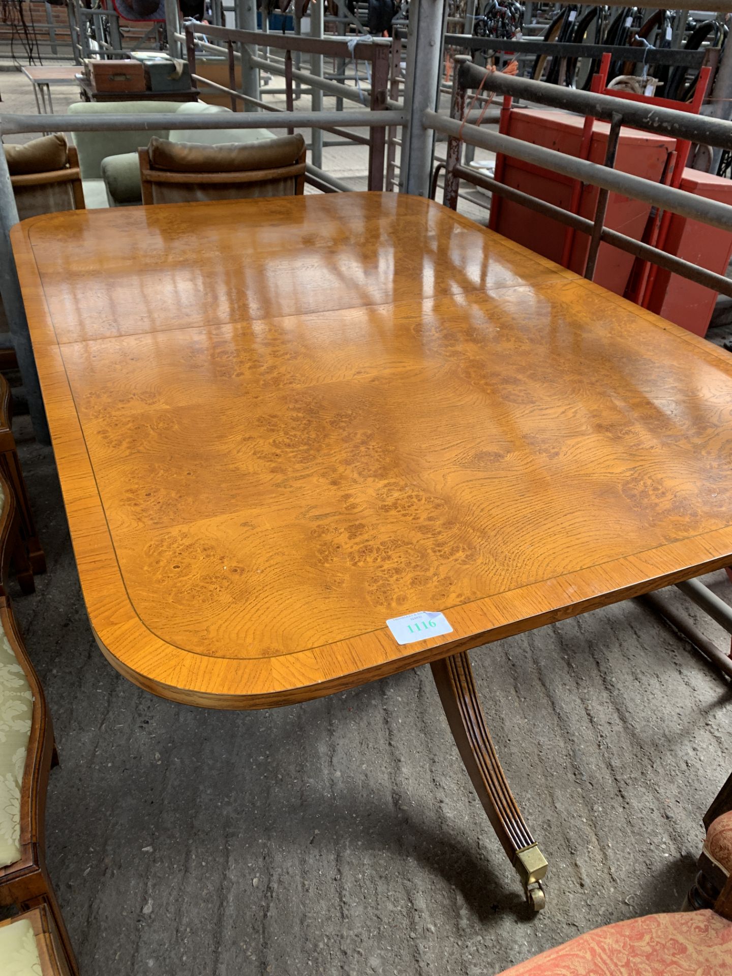 Walnut veneer extendable dining table by Brights of Nettlebed