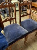 Two mahogany ladder back dining chairs and another