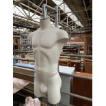 ALU male torso mannequin hanging from a metal support stand