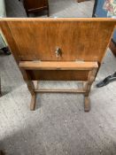 Oak tilt top table with embroidery top under glass