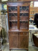 Mahogany glass-fronted bookcase