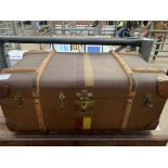 Two fibre travel trunks with wooden bands