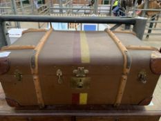 Two fibre travel trunks with wooden bands