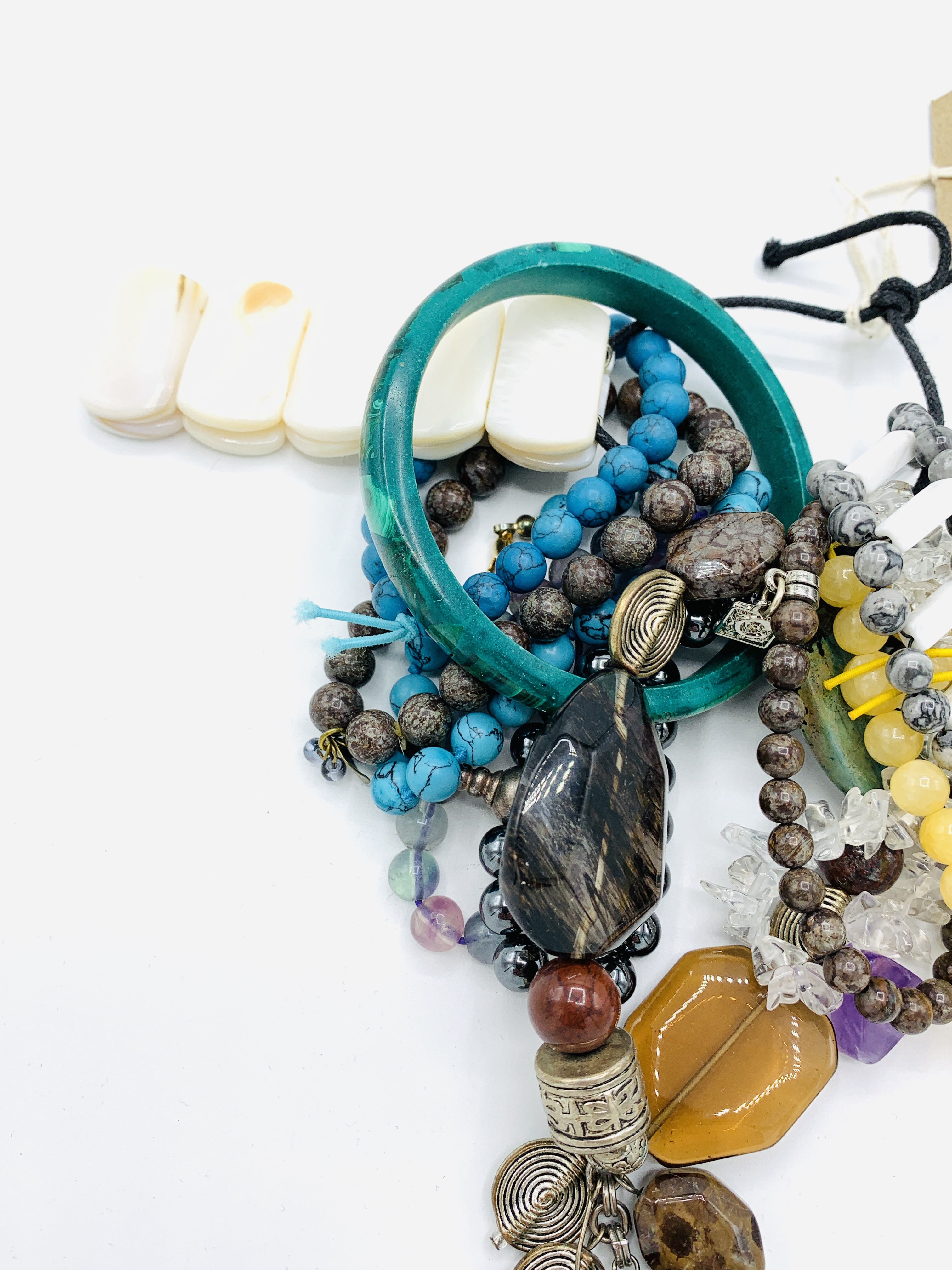 Twelve various gemstone bracelets