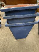 Three blue square planters