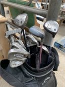 Set of eleven Callaway golf clubs; together with a Donnay trolley
