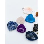 Ten assorted gemstone pendants