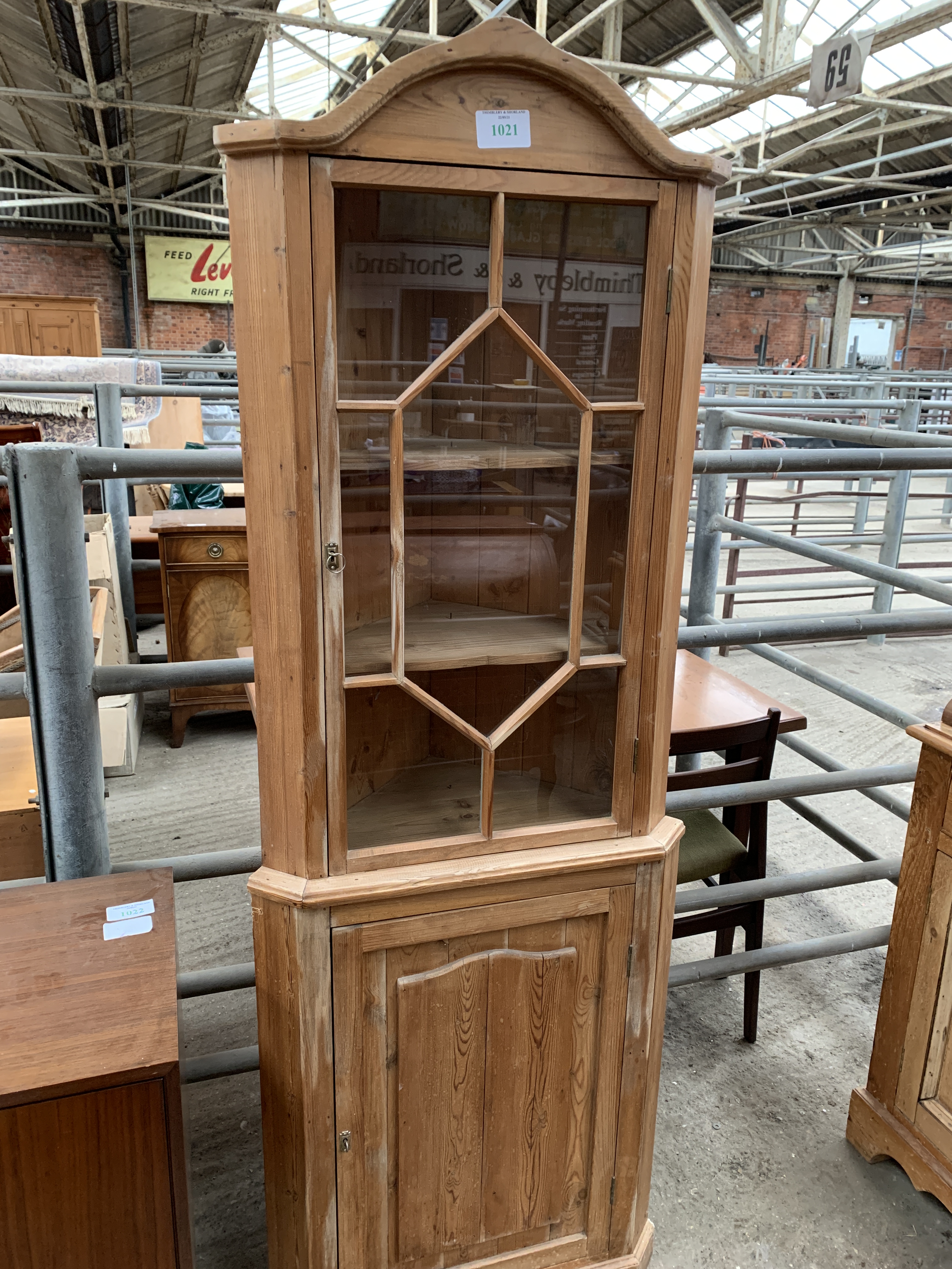 Pine corner cabinet. This item carries VAT.