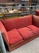 Red upholstered three seat daybed