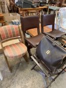 Three chairs together with two luggage stands and a leather briefcase