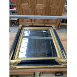 Black and gilt bevelled edge wall mirror