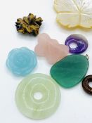 Ten assorted gemstone pendants