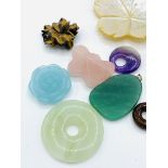 Ten assorted gemstone pendants