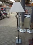 Two metal height adjustable floor standing lamps