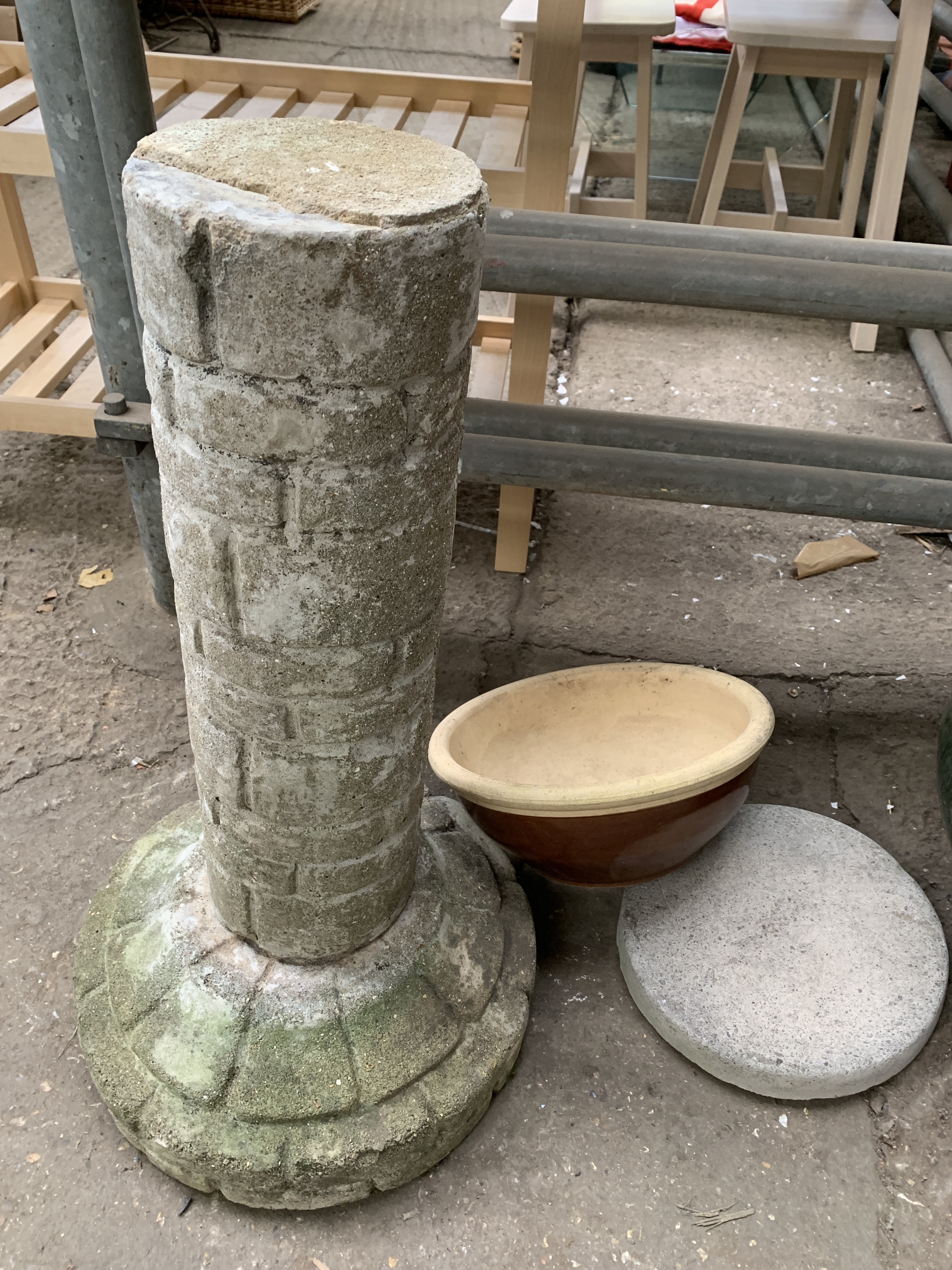 Concrete plinth, ceramic pot and two further pots
