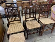 Seven oak framed rail back string seat chairs and a footstool