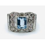 Art Deco style white gold ring set with centre aquamarine surrounded by diamonds